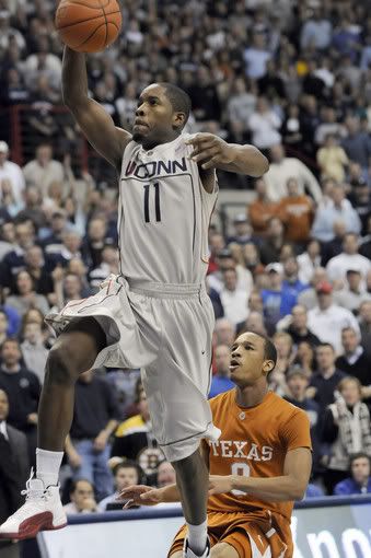 Texas' Avery Bradley can only watch as UConn guard Jerome Dyson puts the finishing touch on a score off of a Texas turnover late in the second half at Gampel Pavilion in Storrs on Jan. 23, 2010. Dyson led the Huskies with 32 points in their 88-74 upset over Texas - Patrick Raycraft/Hartford Courant