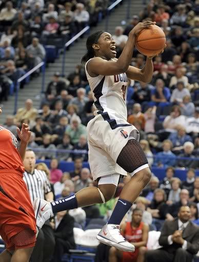 UConn guard Kalana Greene drives to the basket against Rutgers in the first half at the XL Center in Hartford on Tuesday, Jan. 26, 2010 - AP Photo