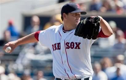 Boston Red Sox starting pitcher John Lackey(notes) works against the Minnesota Twins in a spring training baseball game in Fort Myers, Fla., Saturday, March 6, 2010 - AP Photo