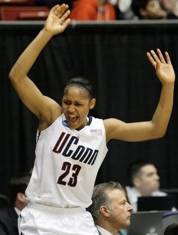 Connecticut's Maya Moore (23) cheers from the bench during the  first half of an NCAA Dayton Regional semifinal college basketball game  against Iowa State, Sunday, March 28, 2010, in Dayton, Ohio. (AP  Photo/Al Behrman)