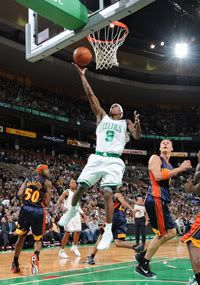 Rajon Rondo lays it in the basket against the Golden State Warriors during the game at the TD Banknorth Garden.  Getty/NBAE Photo.   