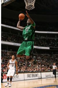 Kevin Garnett going for a slam dunk - NBAE/Getty Images