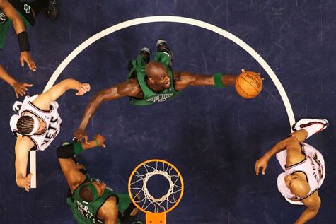 Garnett grabs one of his 11 boards against the Nets - Getty Photo