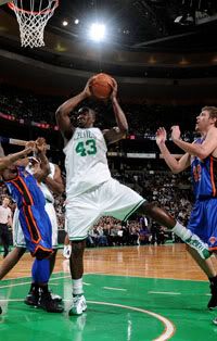 Perk grabs one of his boards on the night.  Getty Photo.  