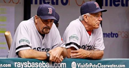 Pitching coach Randy Niemann #68 and manager Bobby Valentine #25 of the Boston Red Sox watch from the dugout against the Tampa Bay Rays during the game at Tropicana Field on September 19, 2012 in St. Petersburg, Florida.