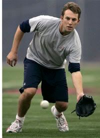 Jed Lowrie fielding a ground ball - AP Photo