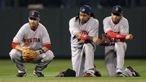 Mike Lowell, Manny Ramirez, Julio Lugo - Getty Images