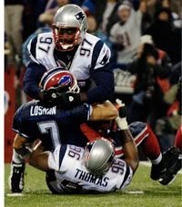 Losman gets whacked by Thomas and Green