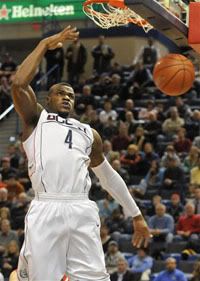 Connecticut's Jeff Adrien scores a basket during the first half of an NCAA college men's basketball game against Fairfield, in Hartford, CT - AP Photo