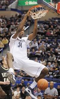 Connecticut's Hasheem Thabeet scores two against Bryant during the first half of their NCAA college men's basketball game in Hartford, Conn. - AP Photo