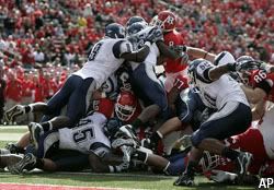 The UConn defense stops Kordell Young on the goal line to force a field goal.