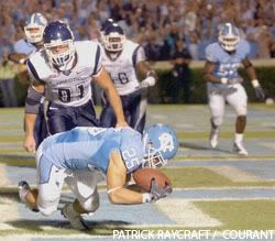 Matt Merletti recovers the blocked punt in the end zone