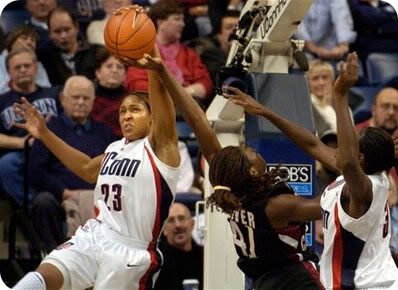 Maya Moore blocks a shot - AP Photo