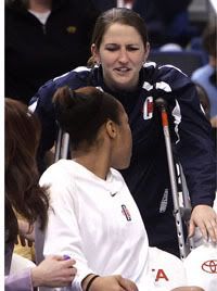 Mel Thomas talks to Brittany Hunter before the game - AP Photo
