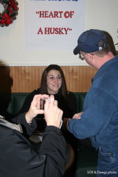 Mel Thomas talks with a fan during a book signing in East Haven, CT