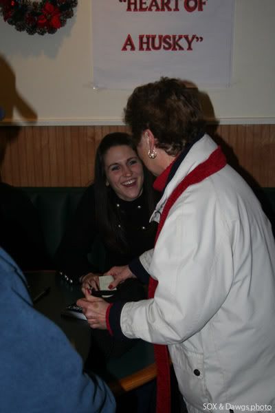 Mel Thomas talks with a fan during a book signing in East Haven, CT