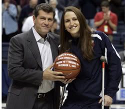 Mel Thomas is presented with her ceremonial ball - AP Photo