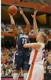 Maya Moore putting up 2 of her 13 points - Courant Photo